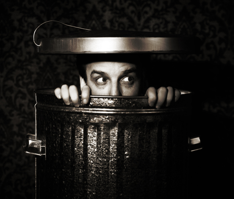 Spying Man in the Garbage Can